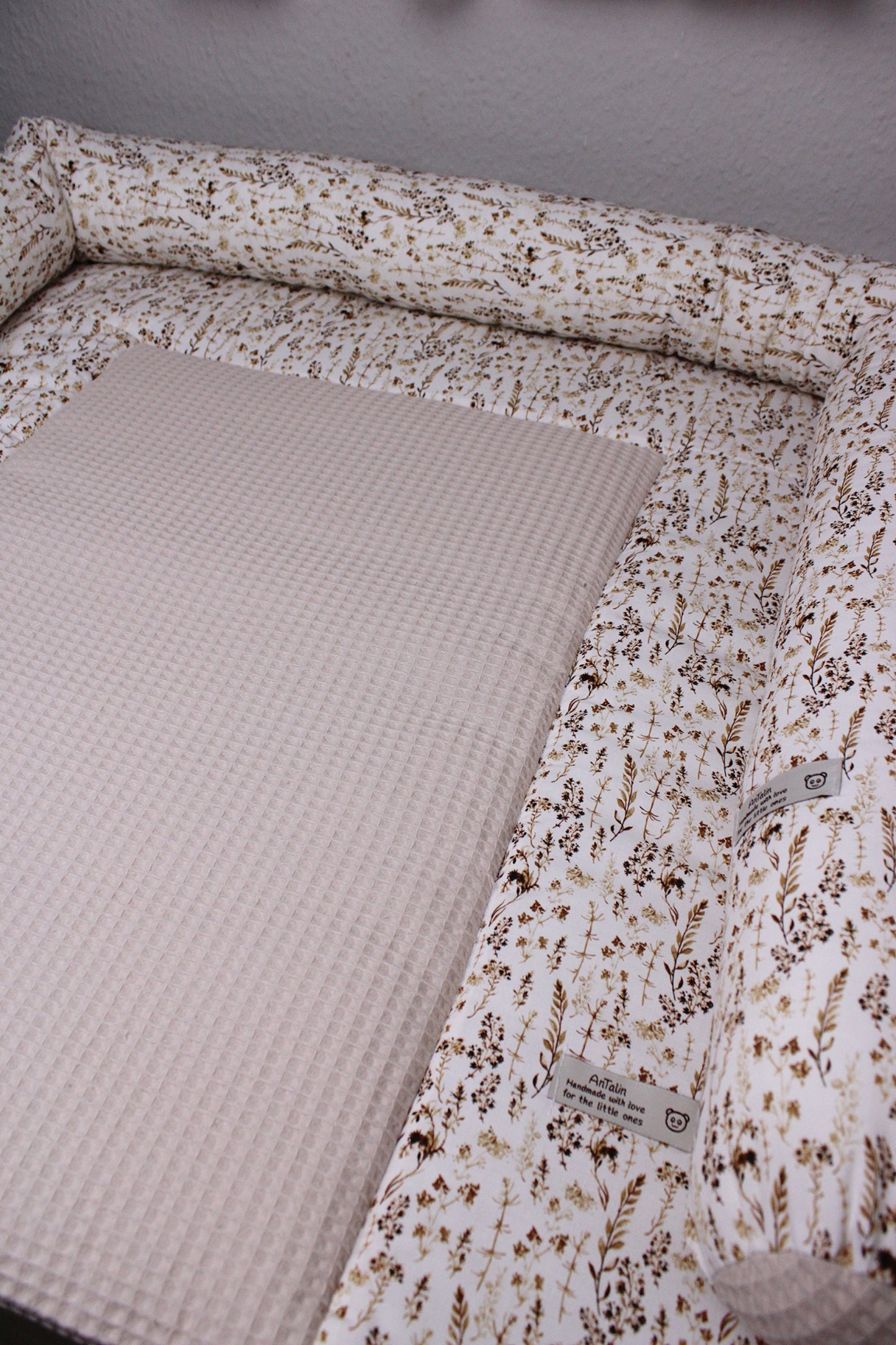 Wickeltischumrandung Gräser