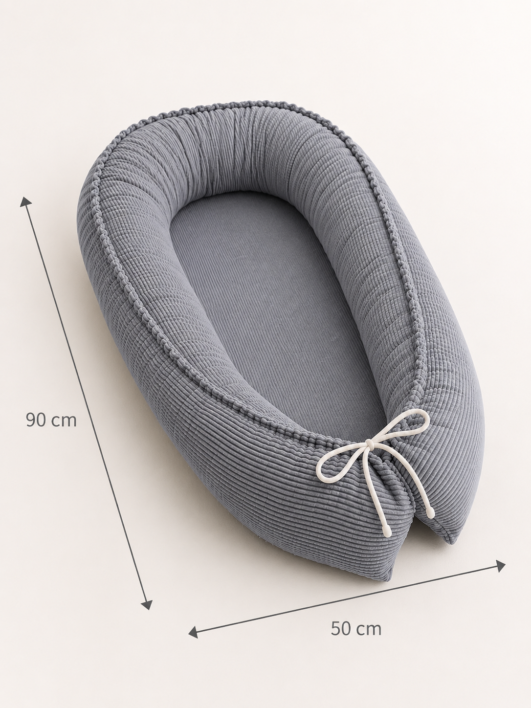 Graues Babynestchen von AnTalin, weiches Nest für Babys, mit Polsterung und angenehmer Textur, ideal für sicheren Komfort.
