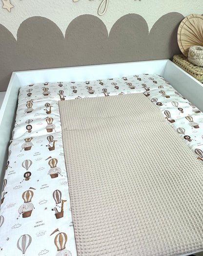 Wickelauflage über den Wolken