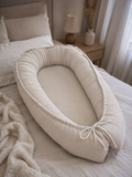 Beigenes Babynest Cord von AnTalin, weiches Nestchen für Babys mit angenehmer Polsterung und Schutzfunktion.